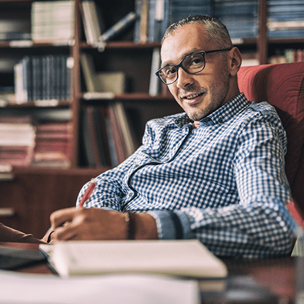 man sitting at desk