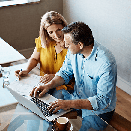 couple filling out mortgage application online